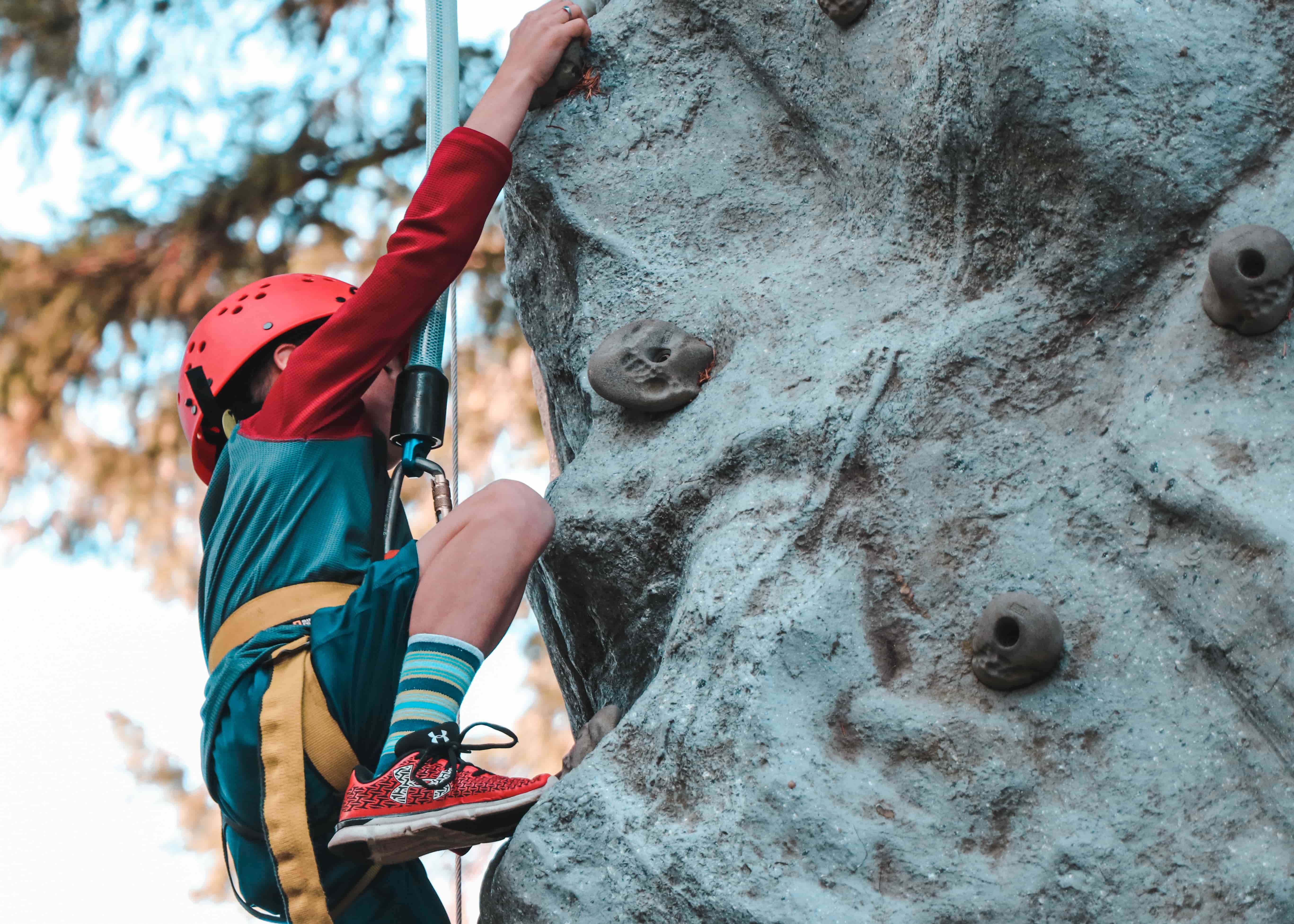 Boy Rockclimbing