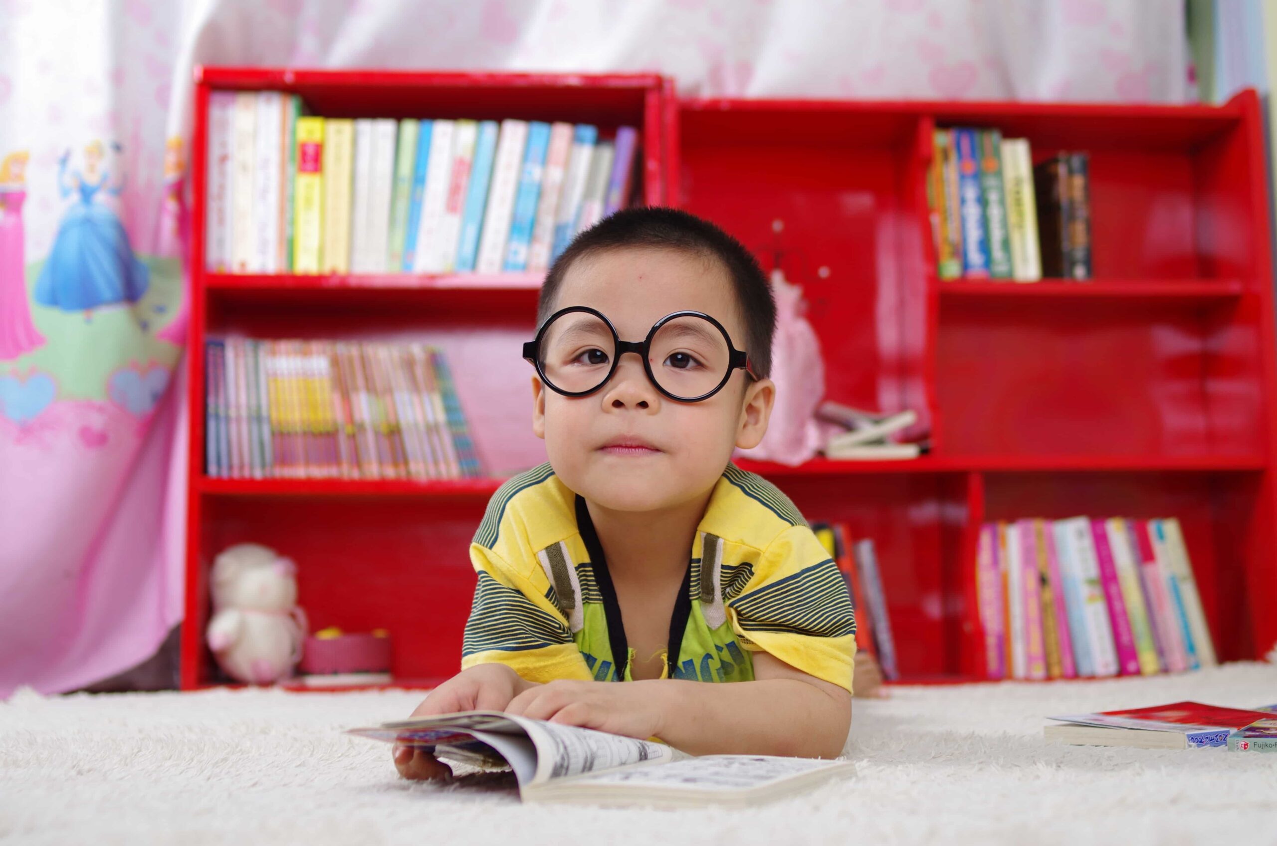 Little boy at Library reading