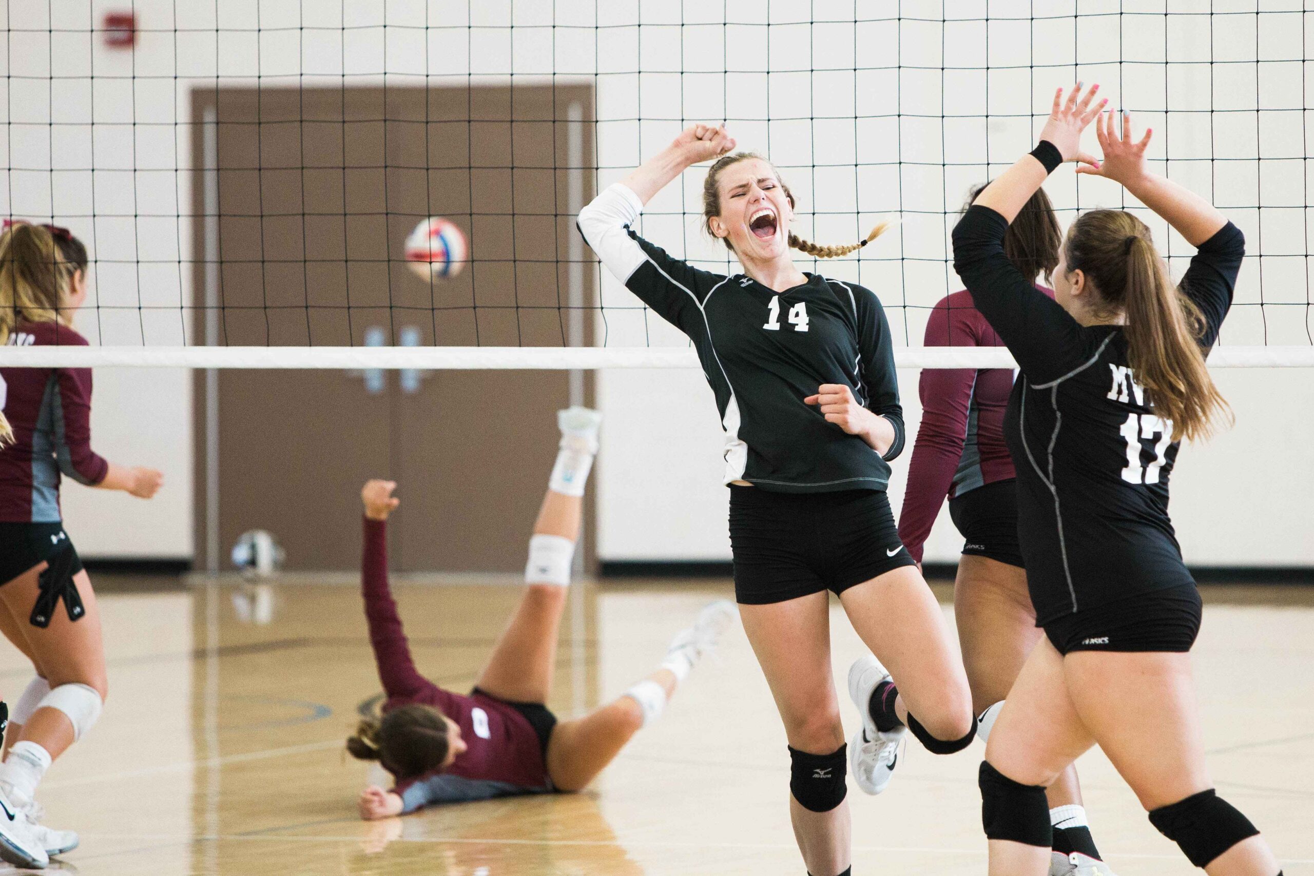 Girls playing volleyball