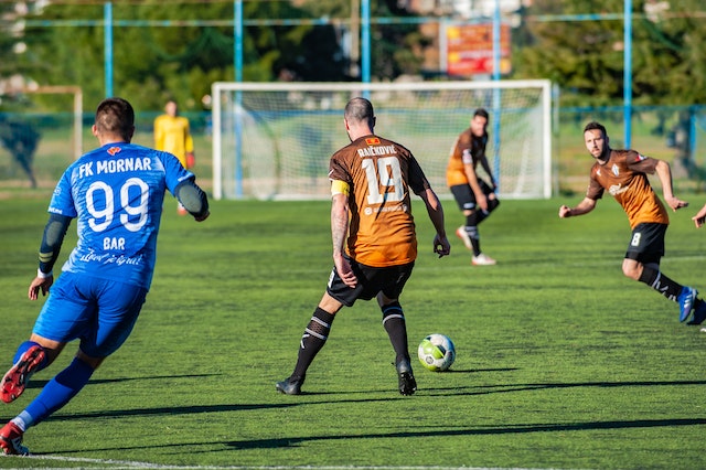 Men playing soccer