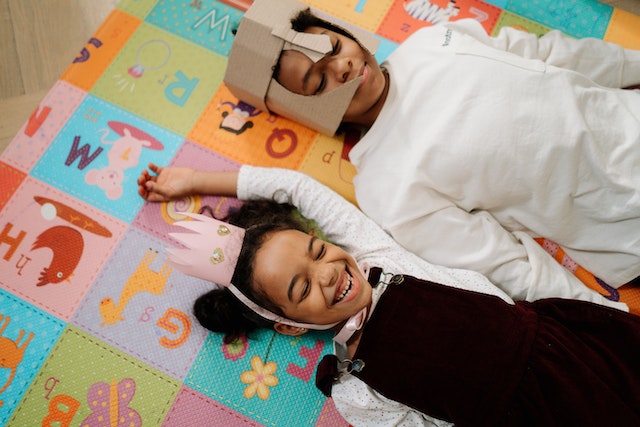 Kids laying down princess crowns