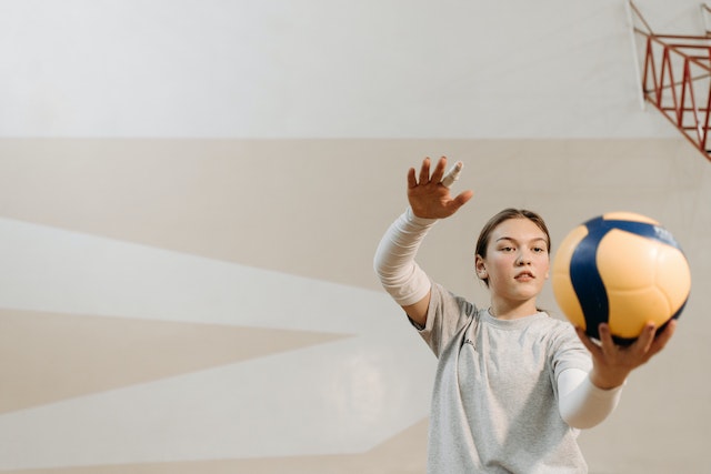 Girl about to hit volleyball