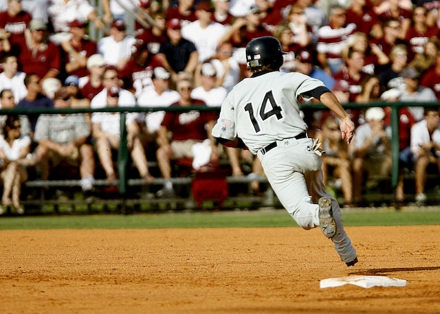 Child running on baseball field